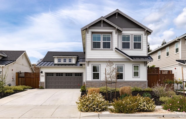 craftsman inspired home with a standing seam roof, metal roof, stone siding, and fence