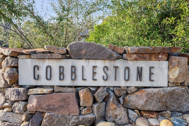 view of community sign