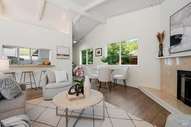 19 Savannah Ave, San Anselmo, CA 94960 - living room with beamed ceiling, baseboards, a tile fireplace, and wood finished floors