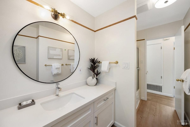 19 Savannah Ave, San Anselmo, CA 94960 - bathroom featuring visible vents, vanity, and wood finished floors