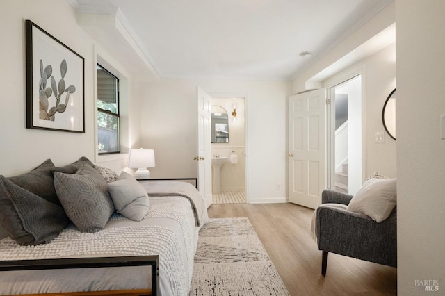 19 Savannah Ave, San Anselmo, CA 94960 - bedroom featuring wood finished floors, ensuite bath, ornamental molding, and baseboards
