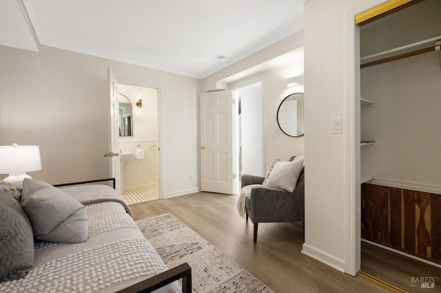 19 Savannah Ave, San Anselmo, CA 94960 - bedroom with ensuite bath, baseboards, and wood finished floors