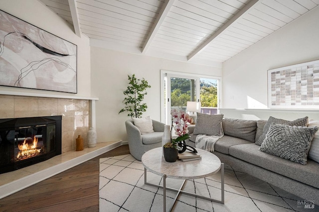 19 Savannah Ave, San Anselmo, CA 94960 - living area featuring a tiled fireplace, lofted ceiling with beams, wooden ceiling, and wood finished floors