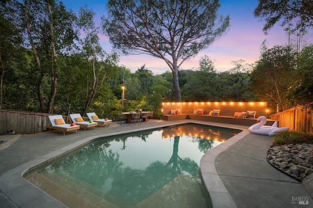19 Savannah Ave, San Anselmo, CA 94960 - pool at dusk featuring a patio area, a fenced in pool, and fence
