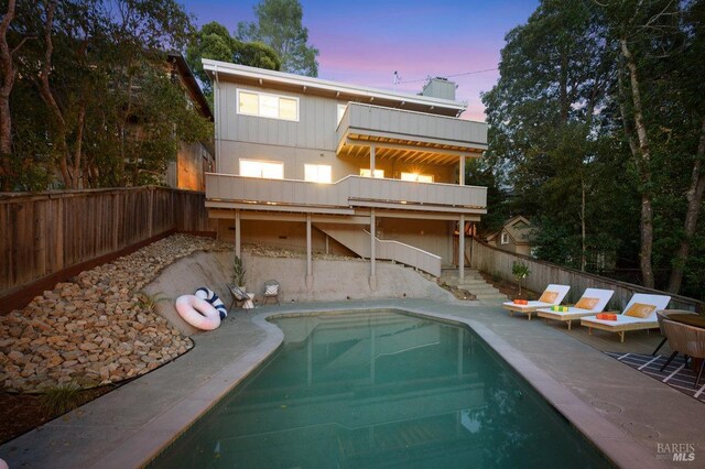 19 Savannah Ave, San Anselmo, CA 94960 - back of property with a patio area, a fenced backyard, a fenced in pool, and a balcony