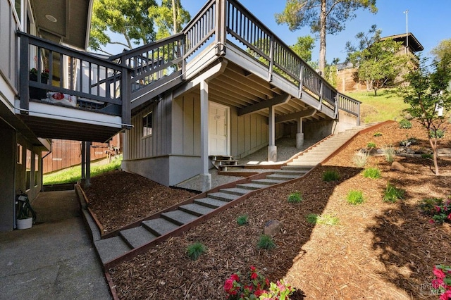 19 Savannah Ave, San Anselmo, CA 94960 - view of side of home featuring a patio, stairway, a wooden deck, and board and batten siding