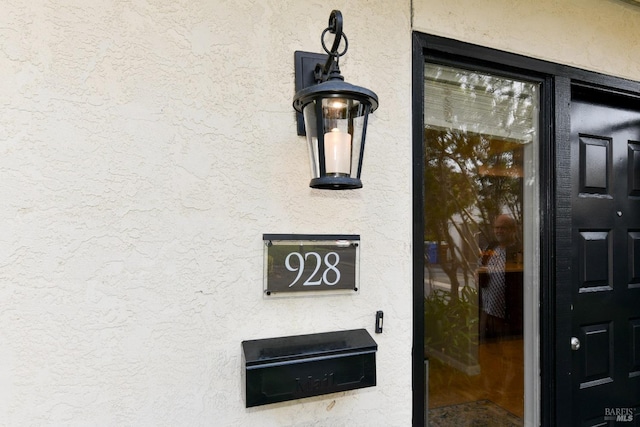 details featuring stucco siding