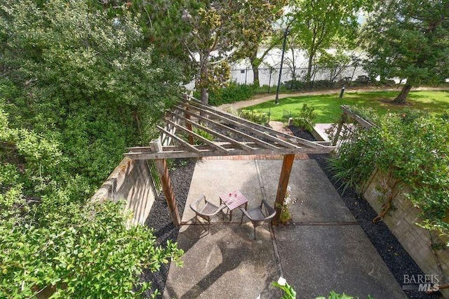 surrounding community with a yard and fence