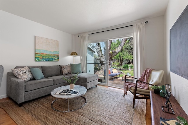 living room with wood finished floors