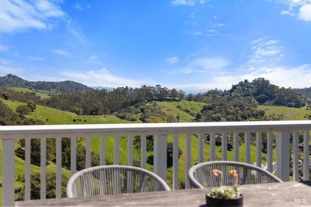 balcony with a forest view