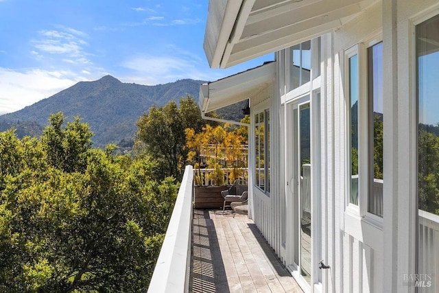 balcony featuring a mountain view