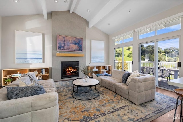 living area featuring a fireplace, recessed lighting, beam ceiling, high vaulted ceiling, and wood finished floors