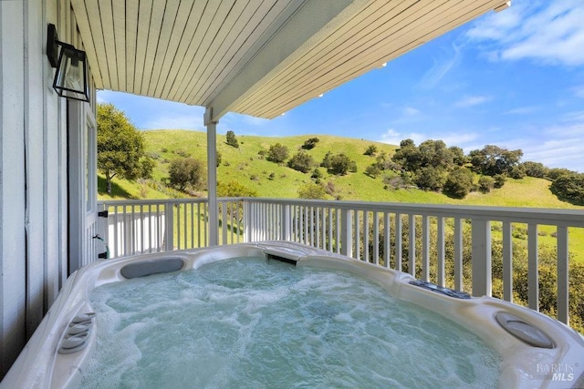 balcony with a hot tub
