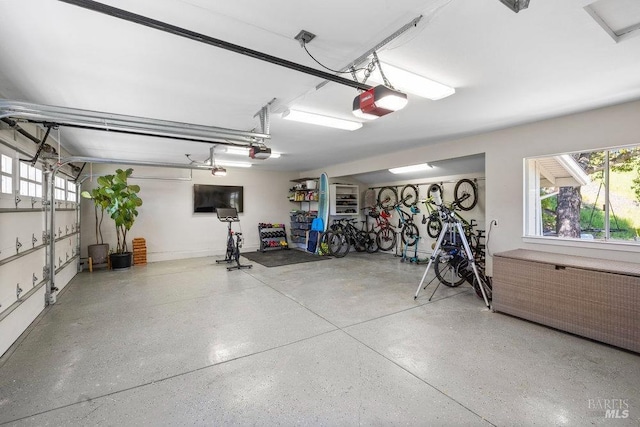 garage featuring a garage door opener