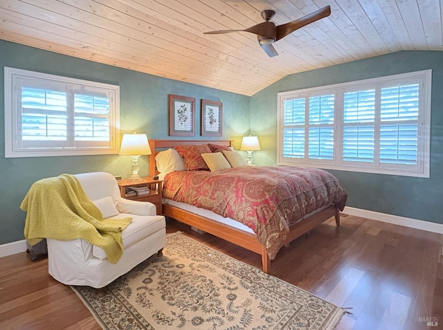 bedroom with vaulted ceiling, wood finished floors, a ceiling fan, wooden ceiling, and baseboards