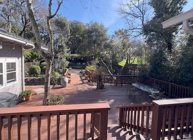 wooden deck featuring fence