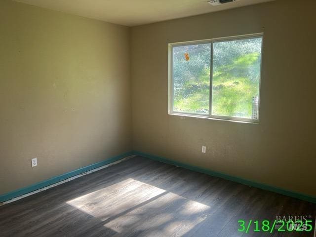 19557 Donkey Hill Rd, Hidden Valley Lake, CA 95467 - unfurnished room with wood finished floors, baseboards, and visible vents