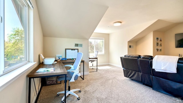 carpeted home office with visible vents and baseboards