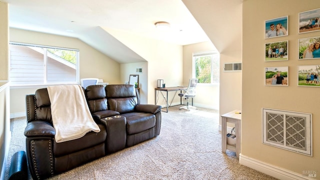 living room featuring baseboards, visible vents, lofted ceiling, and carpet