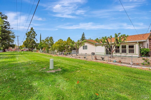 view of yard with fence