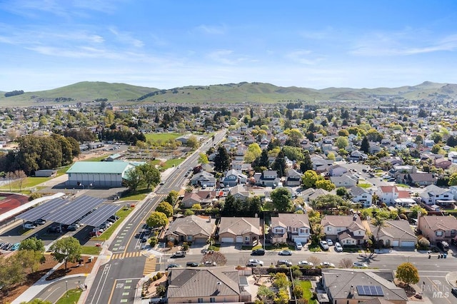aerial view with a mountain view and a residential view