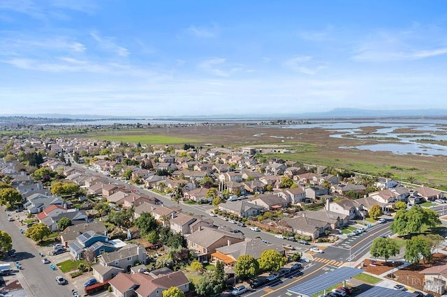 aerial view with a water view and a residential view