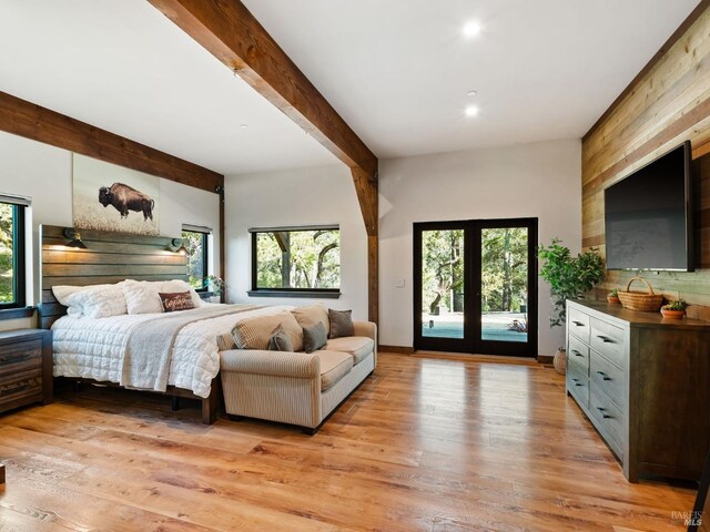bedroom with light wood-style floors, recessed lighting, access to outside, and beamed ceiling