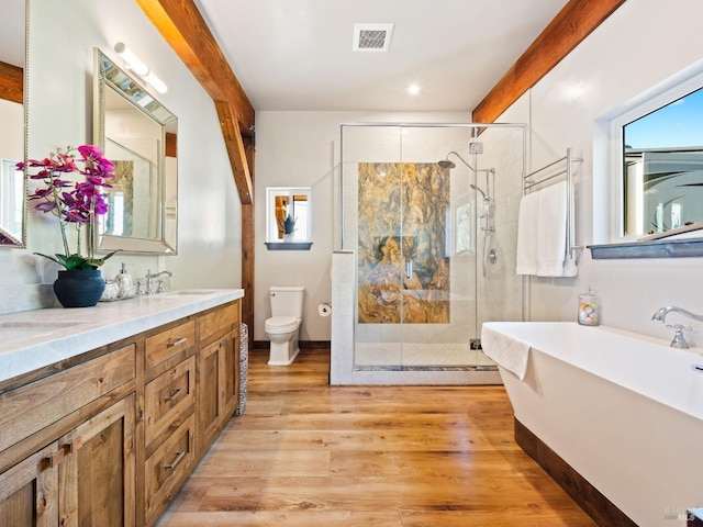 full bath featuring visible vents, a sink, toilet, a shower stall, and recessed lighting