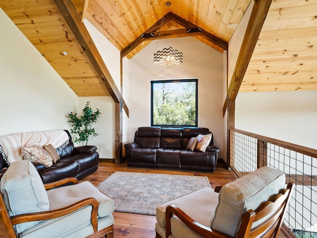 living room with baseboards, wooden ceiling, wood finished floors, and lofted ceiling with beams