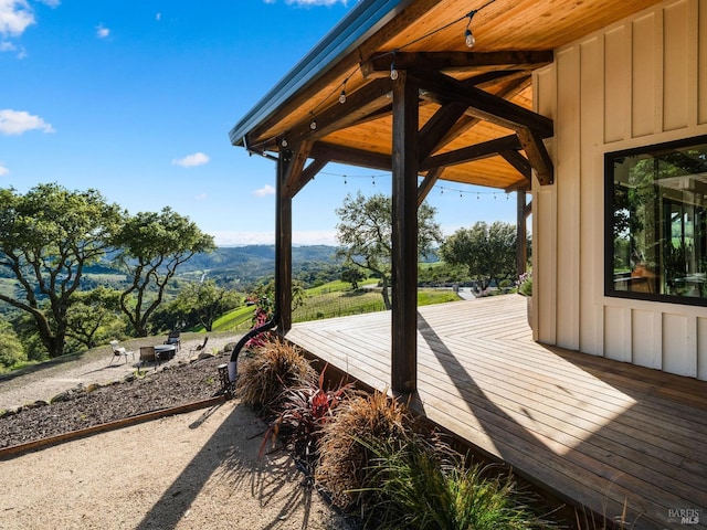 wooden terrace with a mountain view