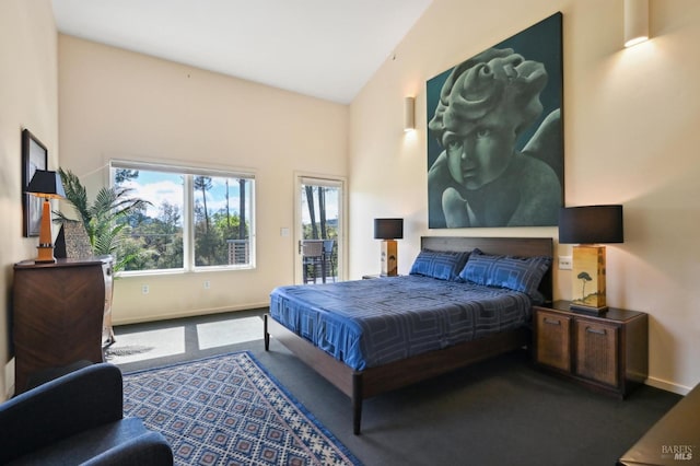 bedroom featuring carpet floors, baseboards, access to outside, and vaulted ceiling