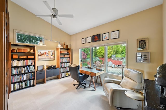 home office with carpet floors, a ceiling fan, and lofted ceiling
