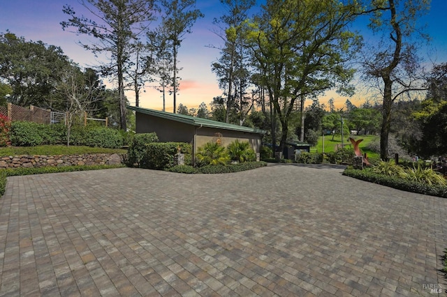 exterior space featuring stucco siding