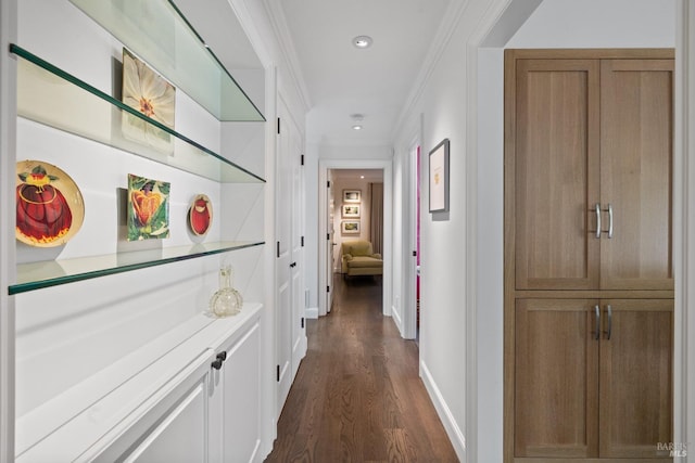 hallway with baseboards, ornamental molding, dark wood-style flooring, and recessed lighting