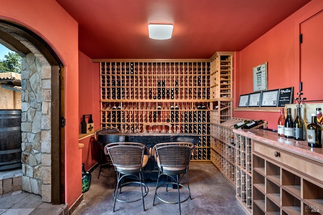 wine room with concrete flooring