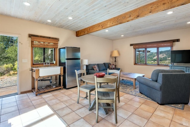 dining room featuring recessed lighting, light tile patterned floors, wooden ceiling, and beam ceiling