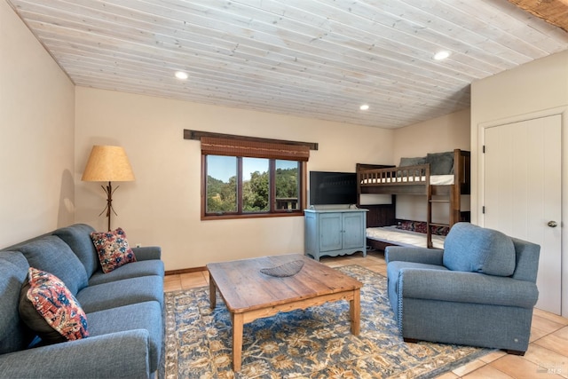 living area featuring light tile patterned floors, recessed lighting, and wood ceiling