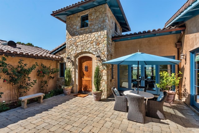view of patio / terrace featuring french doors