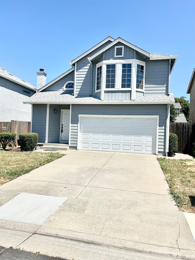 261 Bridgewater Cir, Suisun City, CA 94585 - traditional-style house featuring a garage, board and batten siding, and driveway