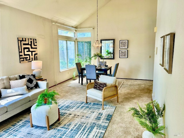 261 Bridgewater Cir, Suisun City, CA 94585 - living room with carpet, high vaulted ceiling, a chandelier, and baseboards