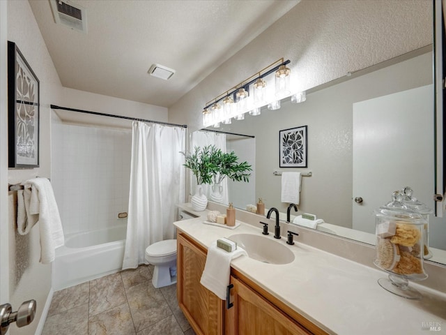 bathroom featuring a textured ceiling, vanity, visible vents, toilet, and shower / tub combo