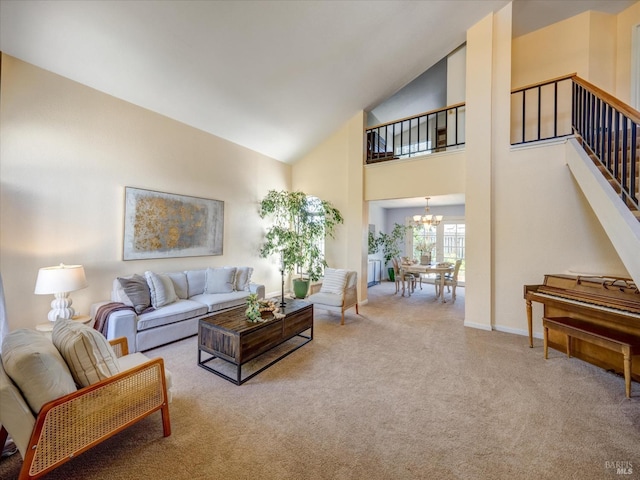 carpeted living area featuring high vaulted ceiling, stairs, a notable chandelier, and baseboards