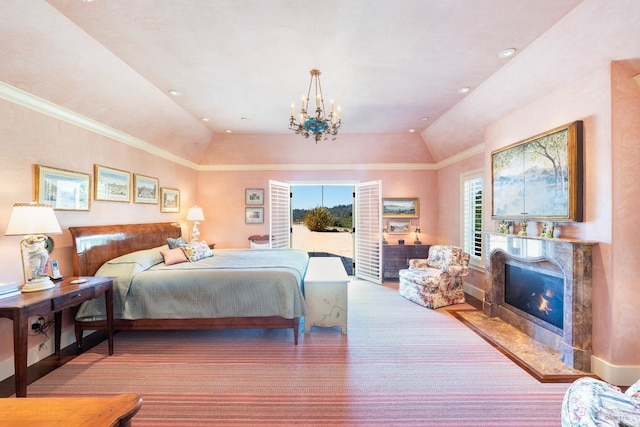 bedroom featuring access to outside, a high end fireplace, lofted ceiling, and a notable chandelier