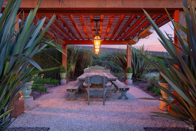 view of patio / terrace featuring outdoor dining space and a pergola