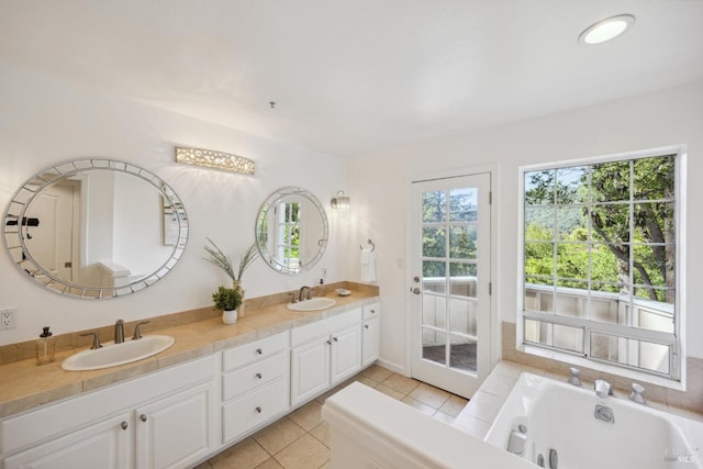 240 Del Casa Dr, Mill Valley, CA 94941 - bathroom featuring tile patterned floors, double vanity, a sink, and a whirlpool tub