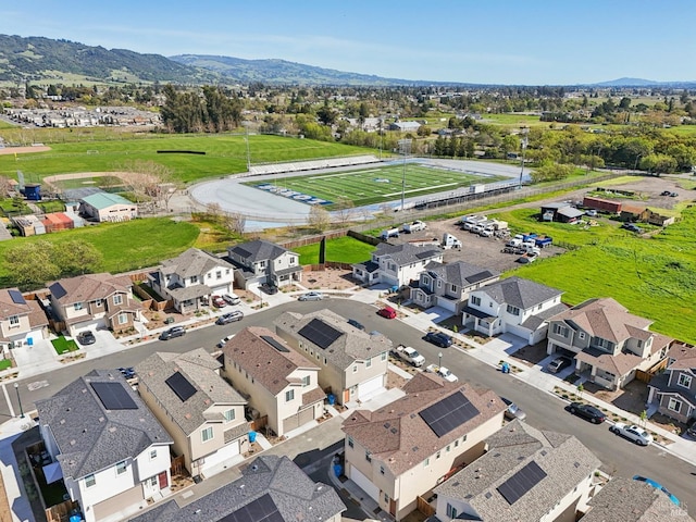 aerial view featuring a mountain view and a residential view