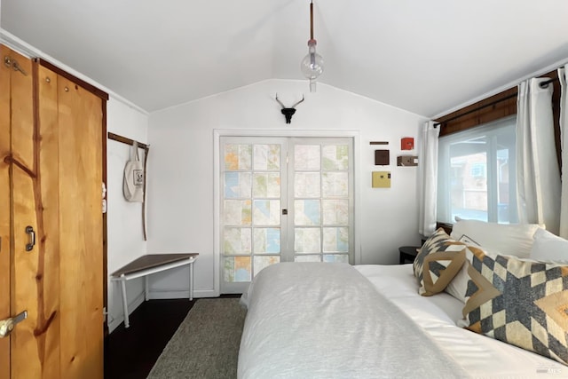 bedroom featuring vaulted ceiling