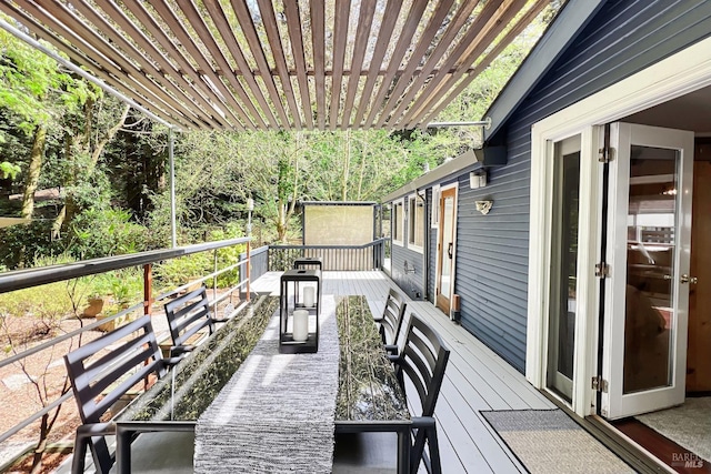 wooden terrace with a pergola