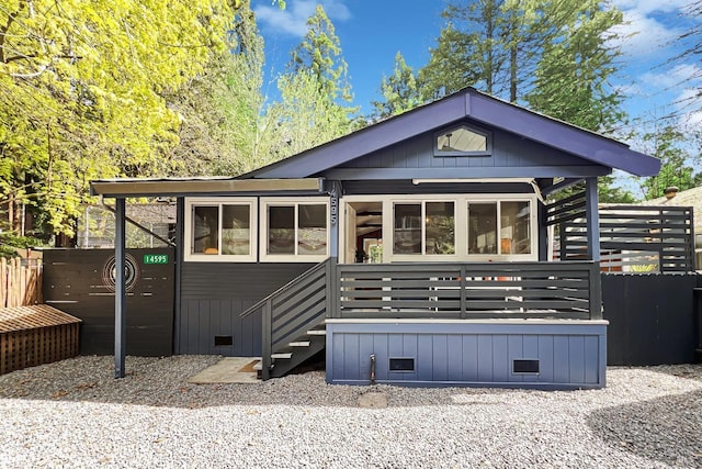 exterior space featuring crawl space and fence