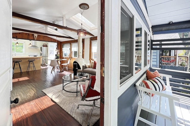 interior space featuring beamed ceiling